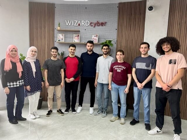 Trainees working at their stations during the Wizard Cyber Training Academy induction